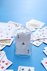 Playing card under a glass dome. Business or success concept.