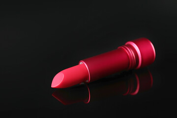 Beautiful lipstick on black background