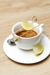 Espresso with lemon. Cafe menu. Gourmet drink.
