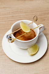 Espresso with lemon. Cafe menu. Gourmet drink.