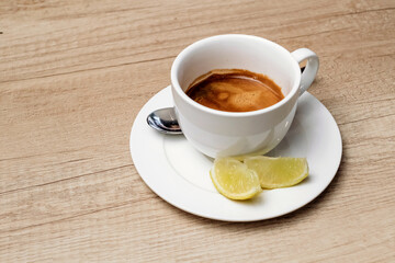 Espresso with lemon. Cafe menu. Gourmet drink.