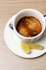 Espresso with lemon. Cafe menu. Gourmet drink.