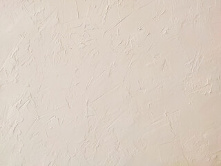 beige textured decorative stucco background with place for text
