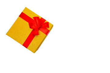 One Colorful Golden Gift Box Wrapped Up With Red Ribbon Isolated Over White Background.