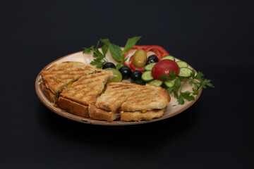 toast plate, cherry, cucumber, olive