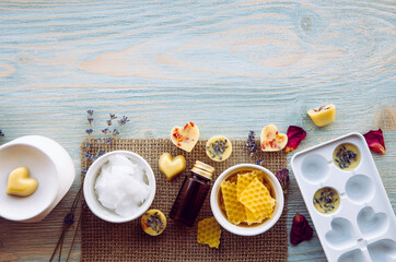 Making of mini wax melts for aroma lamp diffuser at home concept. Tools ingredients on table...