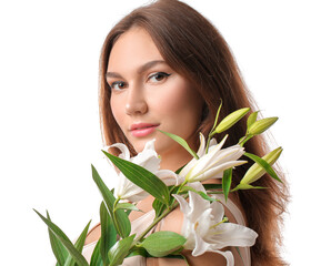 Naklejka premium Beautiful young woman with fresh lilies on white background