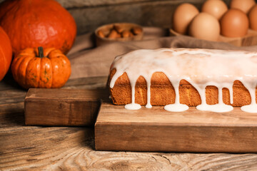 Tasty pumpkin pie on table