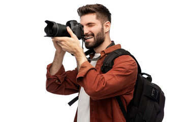 photography, travel and people and concept - happy smiling man or photographer with digital camera...
