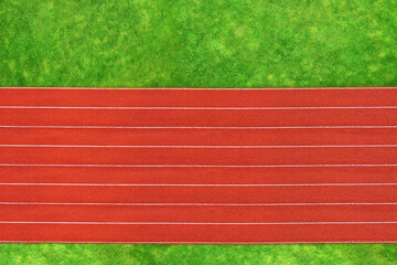 Running track stadium outdoors, top view, green grass
