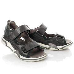 Stylish gray baby sandals for a boy on a white background.