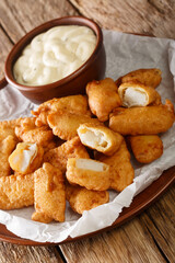 Kibbeling is typical Dutch street food, it consists of bits of fish dunked in batter that are deep...