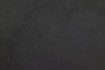 Black background texture. Black plaster cement. Black wall. Abstract background