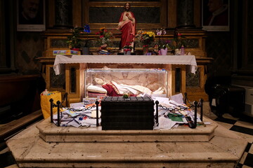 Church of Santa Lucia. In front of the statue of the saint, the children leave the letters with...