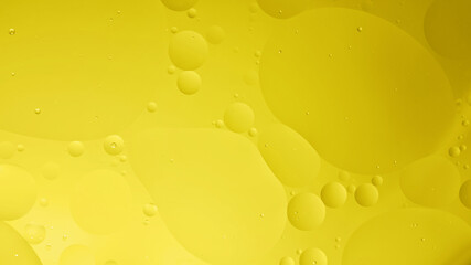 oil with bubbles on on dark blue background. Abstract background.