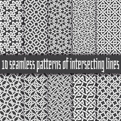 Vector set of abstract seamless patterns. Ten swatches of white lines on black backgrounds.
