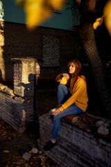 Beautiful caucasian young woman drinking coffee outdoors