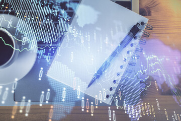 Multi exposure of forex chart drawing and work table top veiw. Concept of financial analysis.