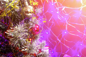 Obraz na płótnie Canvas Christmas tree with toys, balls, garlands and lights, new year background