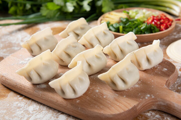 Dumplings background. Cooking dumplings in the kitchen.