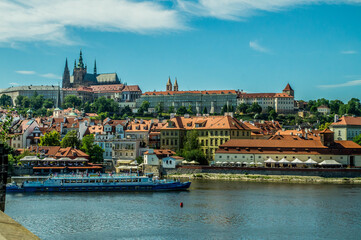 Fototapeta premium View on Prague Castle, Czech Pražský hrad, also called Hradčany, collective name for an aggregation of palaces, churches, offices, fortifications, courtyards, and gardens in Prague.
