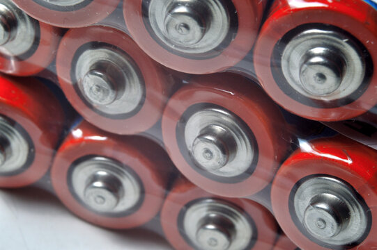 Electric batteries and accumulators of AAA AA standard size. close-up.