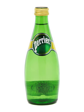 BUCHAREST, ROMANIA - AUGUST 13, 2015. Bottle of Perrier Sparkling Natural Mineral Water, fortified with gas from the spring
