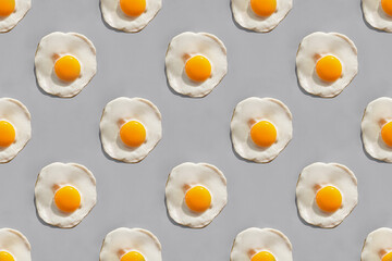 Fried eggs on gray background