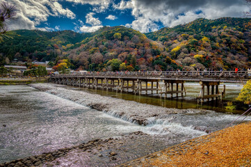 Fototapeta premium Katsura river in Arashiyama, Kyoto, Japan, in autumn