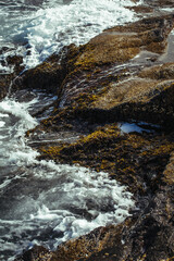 waves crashing on rocks