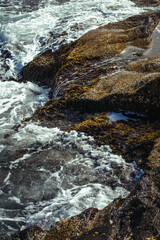 waves crashing on rocks