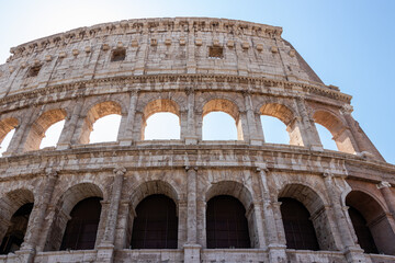 Roman colosseum up close. An ancient arched structure.
