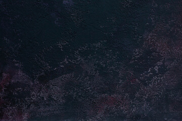 Horizontal photograthy of a hand-painted background texture in black with pink 