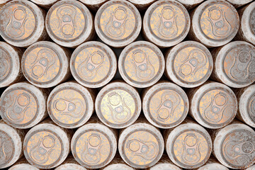 Group of frozen gold aluminum energy drink cans from above closeup full frame