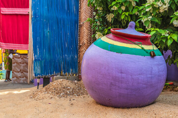 Colorful pot standing in the African village keta Ghana West Africa