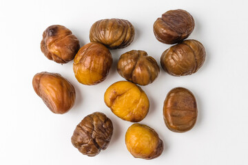 Roasted chestnuts on a white background