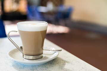 Latte macchiato or cappuccino in glass