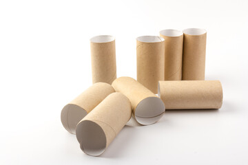 empty paper toilet rolls on white background