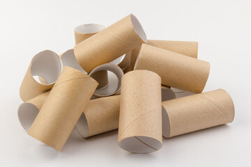 empty paper toilet rolls on white background