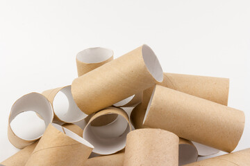 empty paper toilet rolls on white background