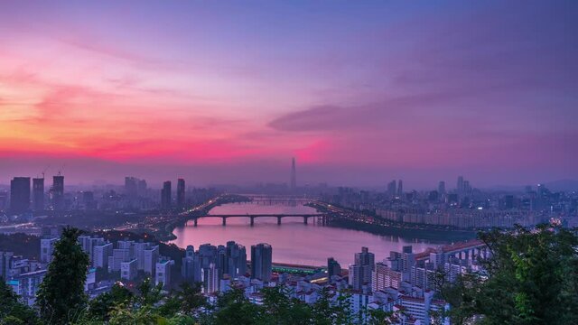 Time lapse 4k Sunrise of Seoul city at han river in South Korea.