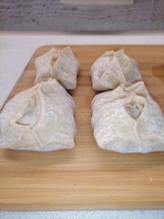 dumplings on a wooden board