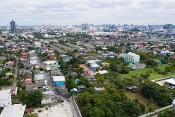 Fototapeta premium Aerial city view from flying drone at Nonthaburi, Thailand, top view of the city 