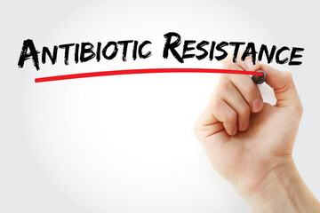 Antibiotic resistance text with marker, concept background