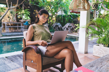 Joyful woman having online studies