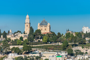 Fototapeta na wymiar Historic buildings and Abbey of the Dormition , an abbey and the name of a Benedictine community in Jerusalem on Mount Zion, View from Mount of Olives.