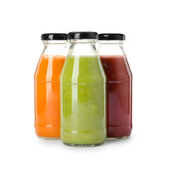 Bottles of fresh juices on white background