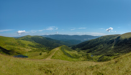 Fototapeta na wymiar Panoramic view of Carpathian mountains on summer sunny day