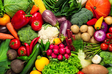 Naklejka na ściany i meble Different fresh vegetables as background, closeup view
