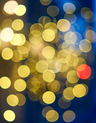 Bokeh balls from christmas lights in the evening out on the streets